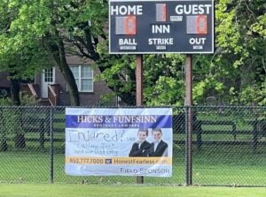Photo of Hicks & Funfsinn banner at Bluegrass Little League’s Field 4