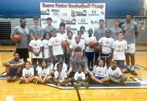 Photo of players attending Reece Potter basketball camp, sponsored by Hicks & Funfsinn.